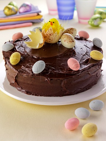 Chocolate Easter cake with mini eggs and fluffy chick