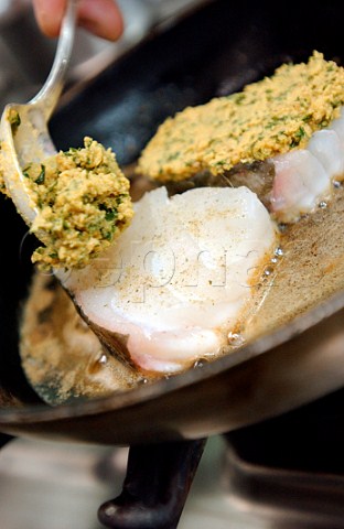 Skrei Arctic cod With a herb crust being pan fried