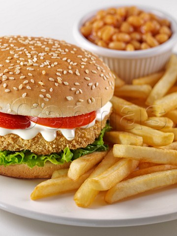 Chicken burger with salad chips and baked beans