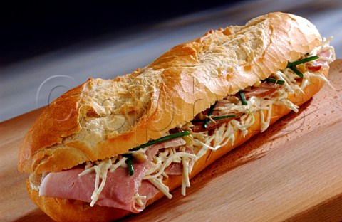 Baguette filled with ham and grated celeriac