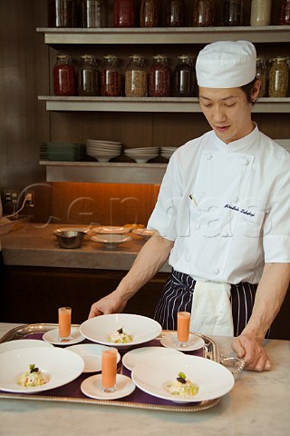 Preparing Crab mayonnaise with avocado and sweet corn chilled tomato gazpacho and herb focaccia at Gordon Ramsays Cerise Restaurant Conrad Hotel Tokyo