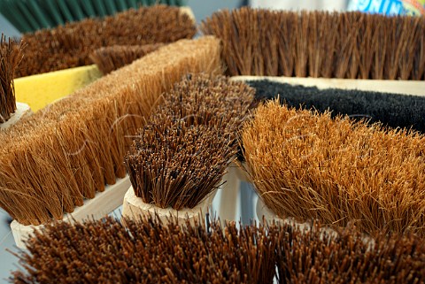 Brooms on sale in Pickering market Yorkshire England