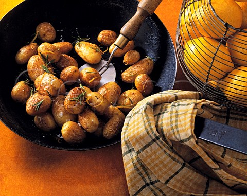 Stirfried potatoes with rosemary and lemon zest