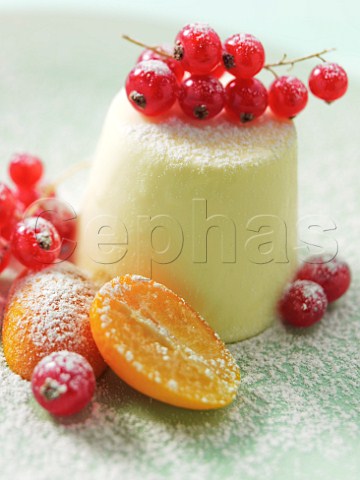 Panna cotta with red currants and orange