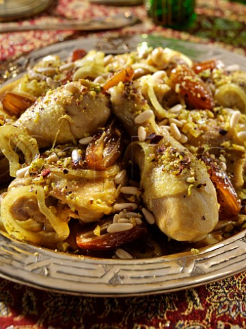 Middle Eastern Chicken cooked with pinenuts and dates