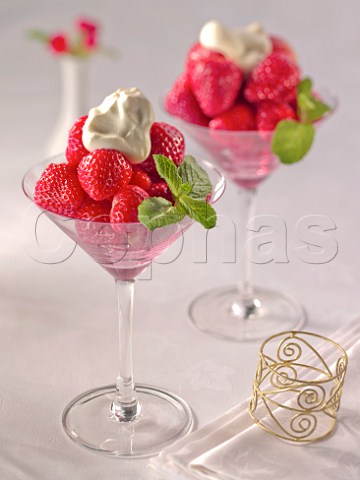 Strawberries and cream in Martini glasses
