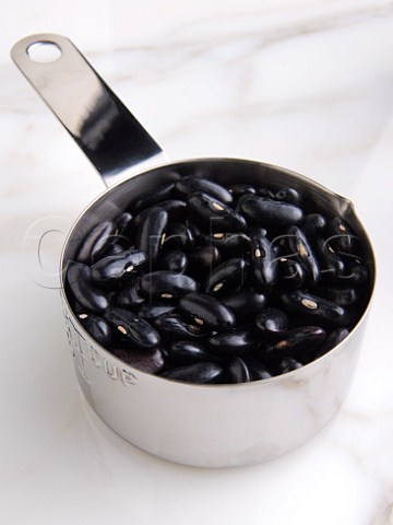 Black kidney beans in a saucepan