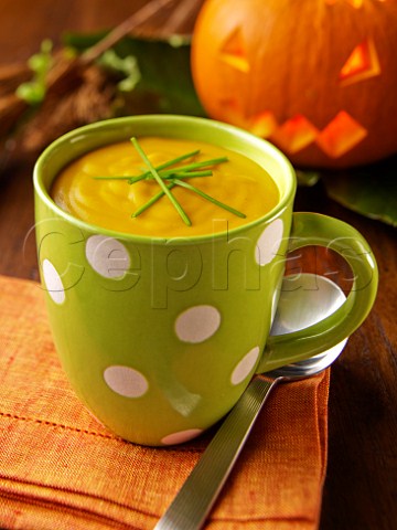 Mug of pumpkin soup