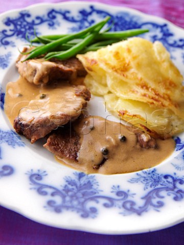 Steak au Poivre with Dauphinoise potatoes and green beans