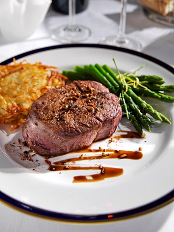 Fillet steak asparagus spears and rosti