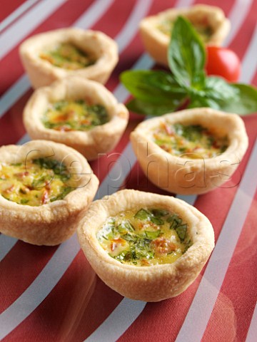 Mini sun dried tomato and herb tarts