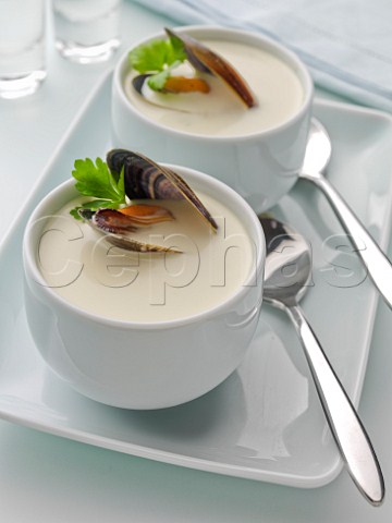 Two bowls of smoked mussel soup