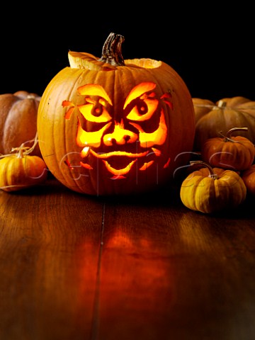 Lit carved pumpkin face