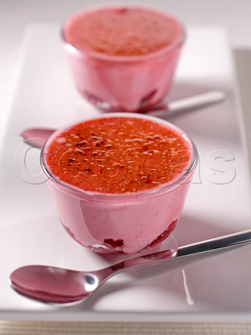 Raspberry crme brle in two glasses