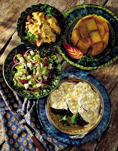 Feta cheese salad aubergine au gratin jelly sponge pudding and marinated chicken in mustard sauce