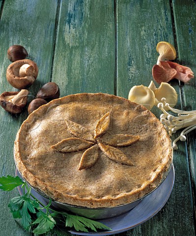 Chestnut pie with wholemeal crust and mushrooms