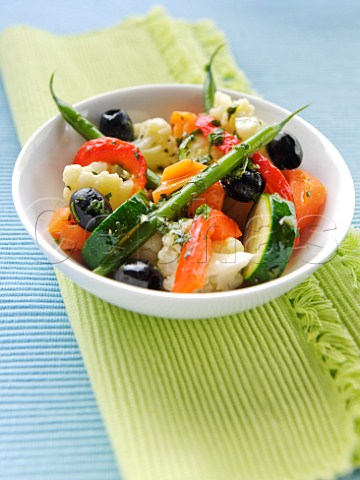 Vegetable side salad with olives