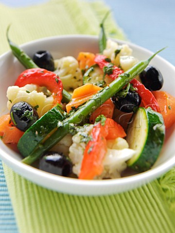 Vegetable side salad with olives