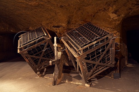 Bottles of sparkling wine in giropalettes in the cellars of BouvetLadubay which have been cut from the tuffeau subsoil  Saumur MaineetLoire France Crmant de Loire