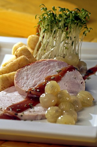 Pork with gooseberries and croquettes