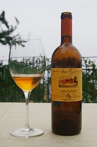 Bottle and glass of Ben Ry Passito di Pantelleria of Donnafugata