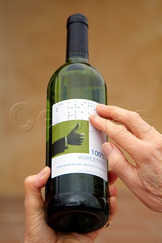 Reading Braille on a wine bottle and label produced by the Worcester Winelands Association South Africa