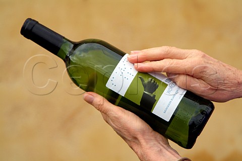 Reading Braille on a wine bottle and label produced by the Worcester Winelands Association South Africa