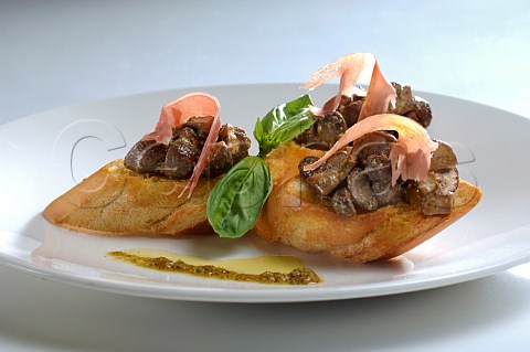 Mushrooms and pancetta ham on toast