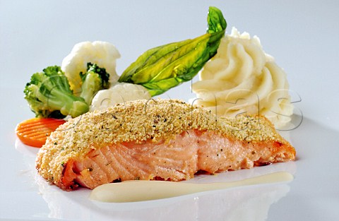 Breadcrumbed salmon steak with vegetables