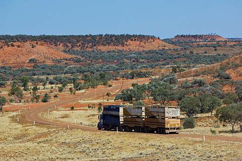 Road train below Cawnpore Lookout in the Lilyvale Hills on the Kennedy Developmental Road between Boulia and Winton in western Queensland Australia