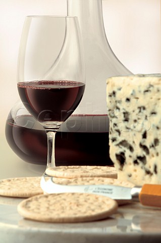 Glass and decanter of Port with blue cheese and crackers