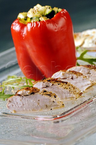 Chicken slices with stuffed red pepper