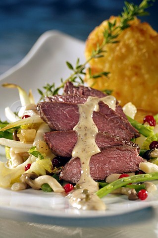 Salt beef with potato fritter and salad