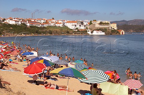 People on the beach by the Mira River estuary at Vila Nova de Milfontes Odemira Portugal