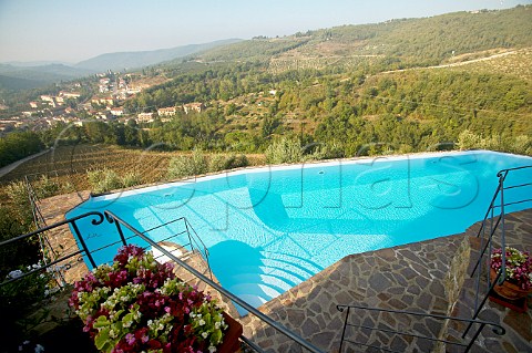 Swimming pool and terrace at the Vineyard with a Butler farmhouse hotel Capannelle Winery at Gaiole Tuscany Italy Chianti Classico