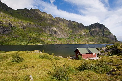 Cabin on lake near village of  Lofoten Islands Norway