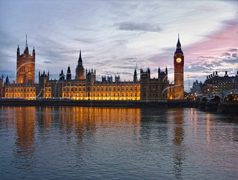 Houses of Parliament reflecting in the River Thames at dusk   London