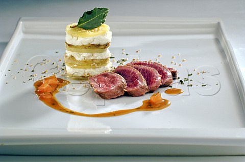 Fillet of steak with cheese and potato stack