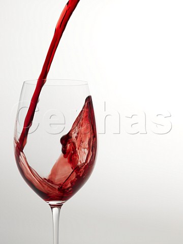 Pouring Cabernet Sauvignon into a Riedel Bordeaux wine glass