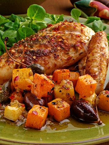 Plate of piri piri chicken and roasted root vegetables