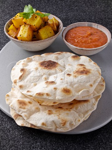Chappatis with curried potatoes and tomato chutney