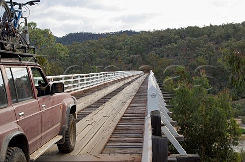 4WD car on Macillops Bridge Snowy Mountains National Park Victoria Australia