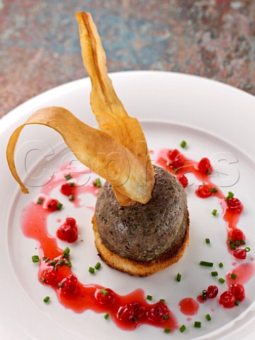 Lamb liver pat on toast with fried parsnip crisps