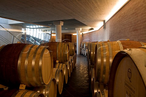 Barrels in the Bricco Rocche cellars of Ceretto Castiglione Falletto Piemonte Italy