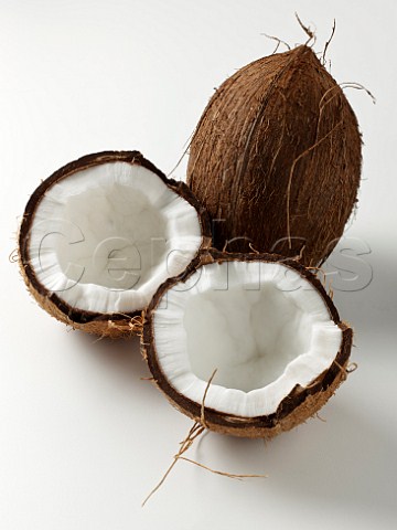 Whole and two half coconuts