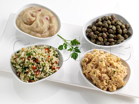 Meze Capers houmous baba ganoush and tabouleh