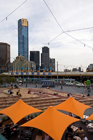 Umbrellas covering alfresco caf seating in Federation Square Melbourne Victoria Australia