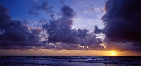 Clouds at sunrise Mission Beach Queensland Australia