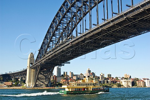 Sydney Ferry and Harbour Bridge from Walsh Bay Sydney New South Wales Australia