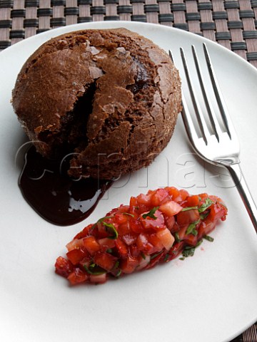Chocolate souffle with strawberry salad